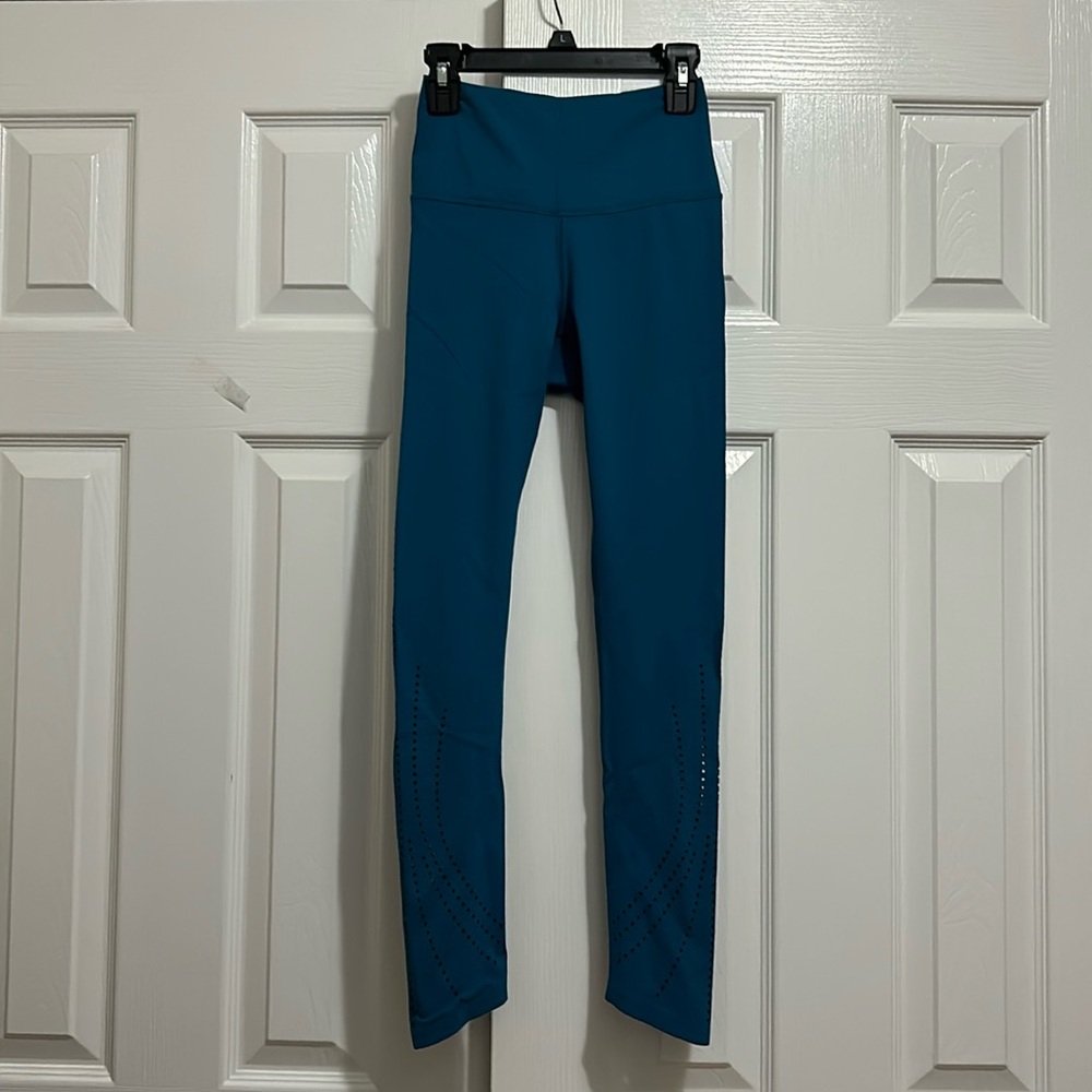 Brand new Calia dark turquoise color leggings size XS
